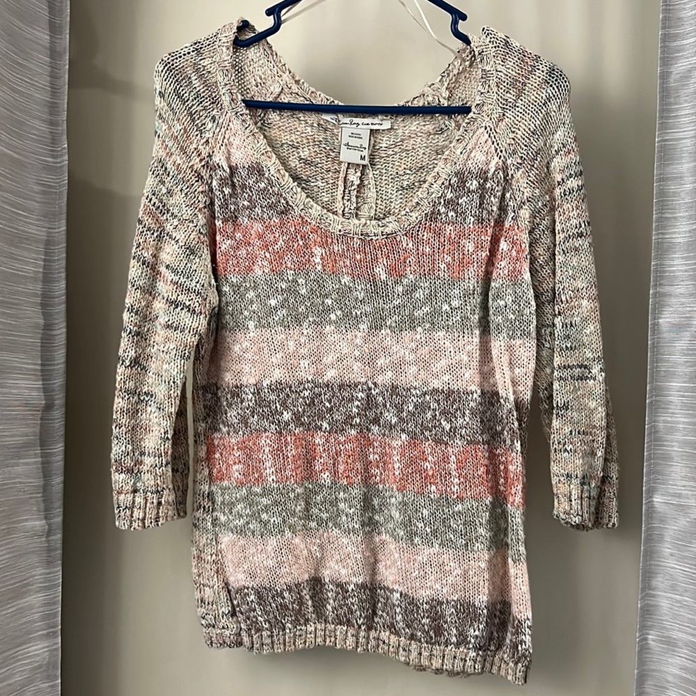 Striped sweater with open back. Size medium